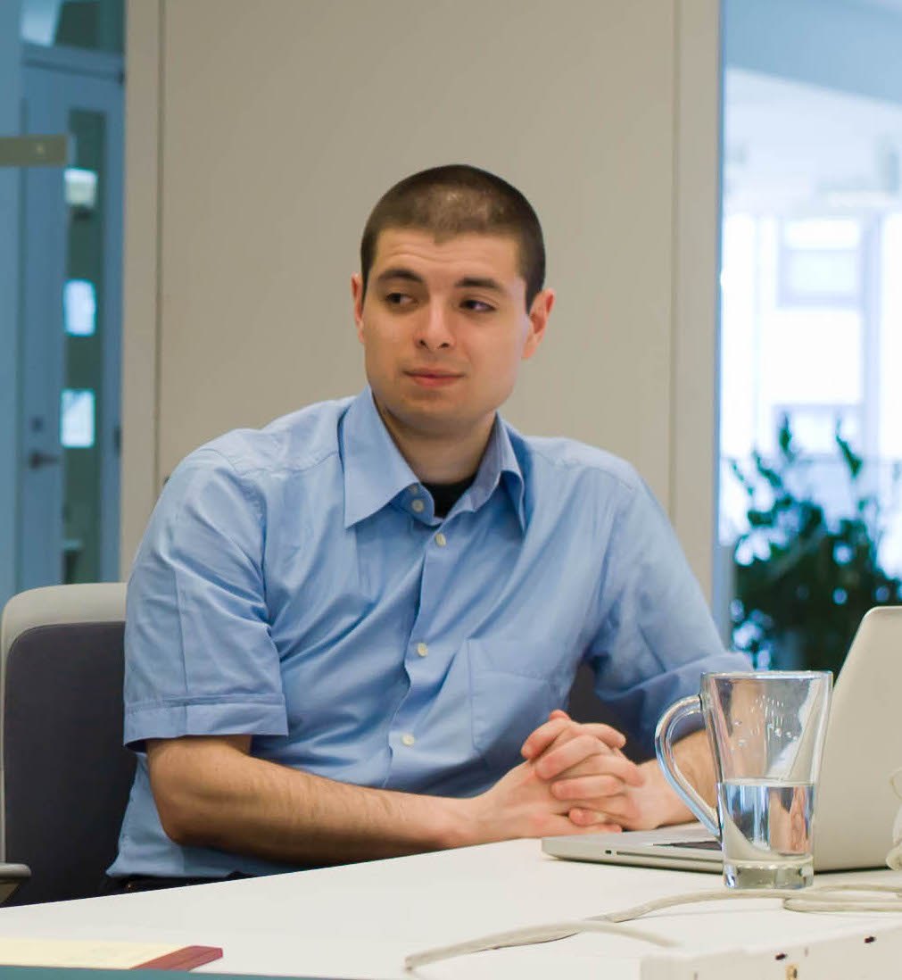 J. Nathan Matias seated at a table during a conversation with Bill Drayton.